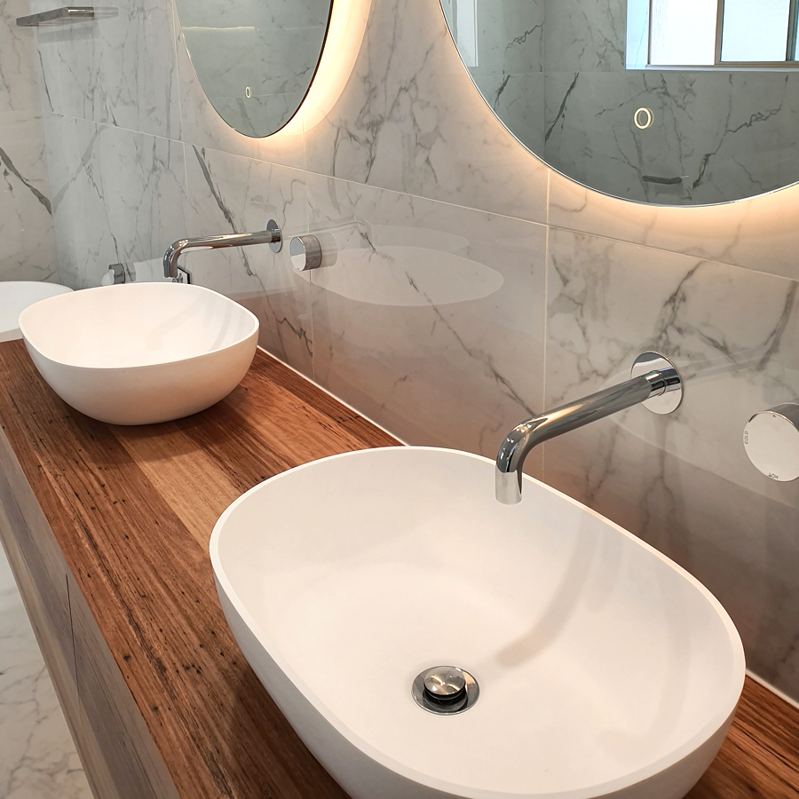 Circular Mirrors over Custom Double Vanity