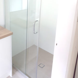 Sliding Shower Door with Square Tiled Inset Drain