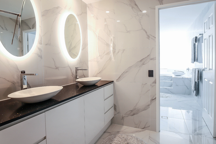 This high-rise Gold Coast bathroom renovation features a combination of three drawers and cupboards.