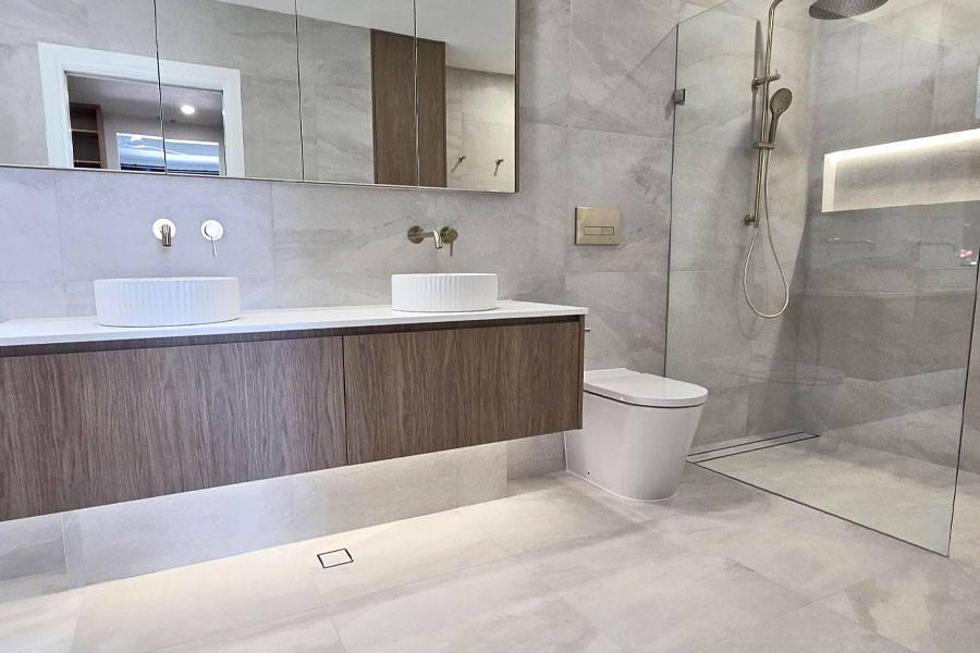 Simple single drawer custom vanities are a fabulous and streamlined solution.