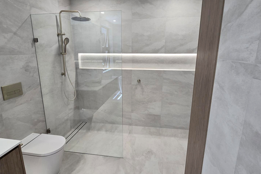 Bath to shower conversion in a bathroom renovation