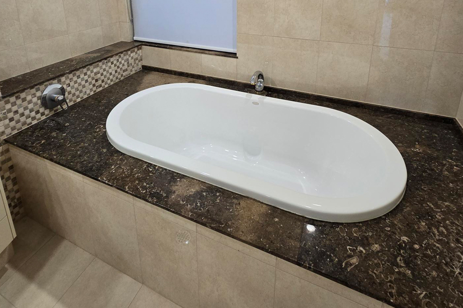 Old bathtub tiling - Hope Island Gold Coast