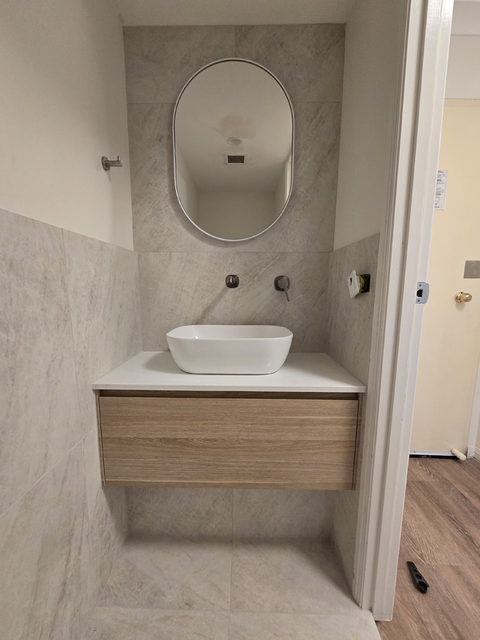 Minor vanity for new toilet