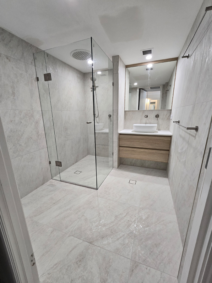 Wide view of bathroom